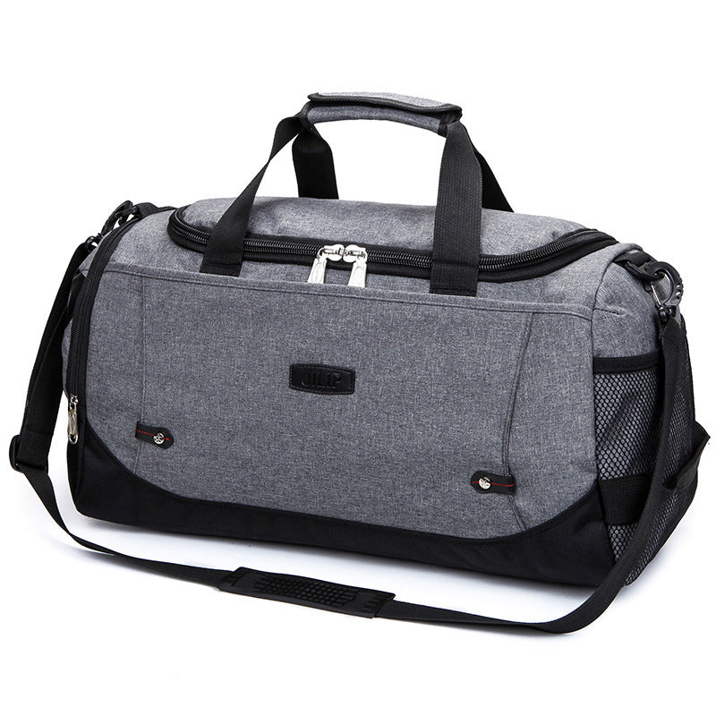 Gray duffel bag with black accents on a white background