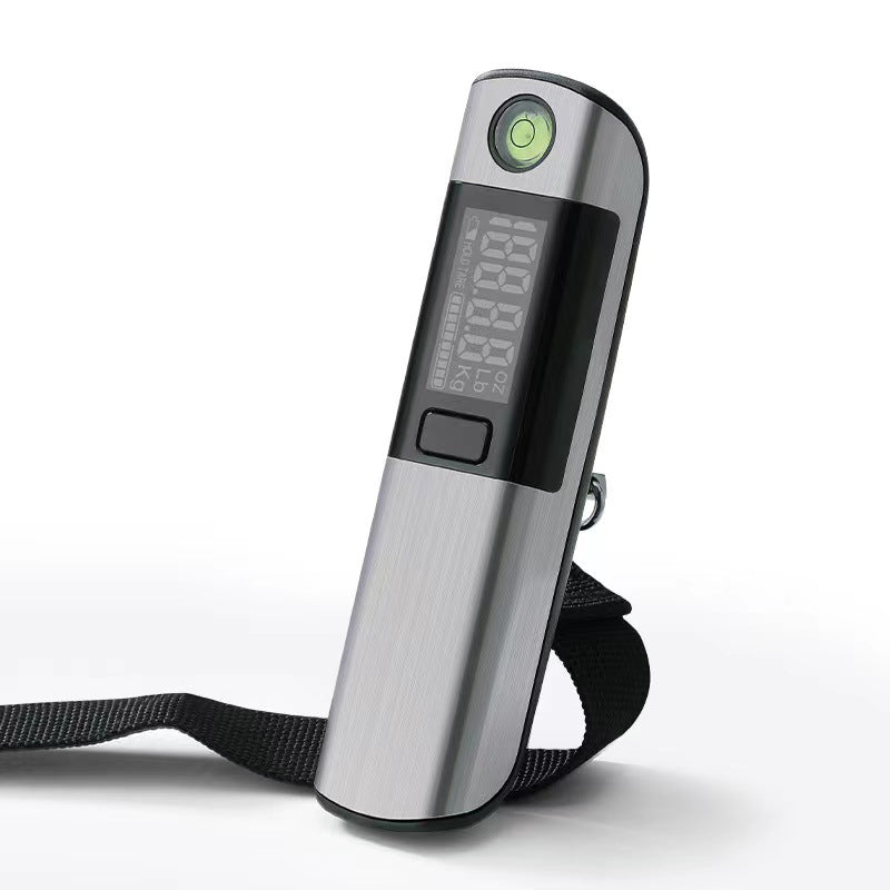 Digital luggage scale with a black strap on a white background