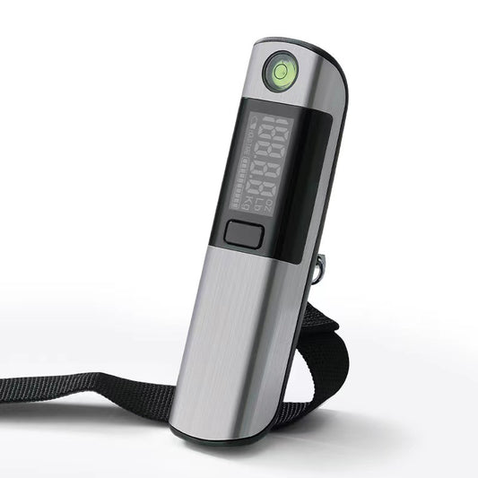Digital luggage scale with a black strap on a white background