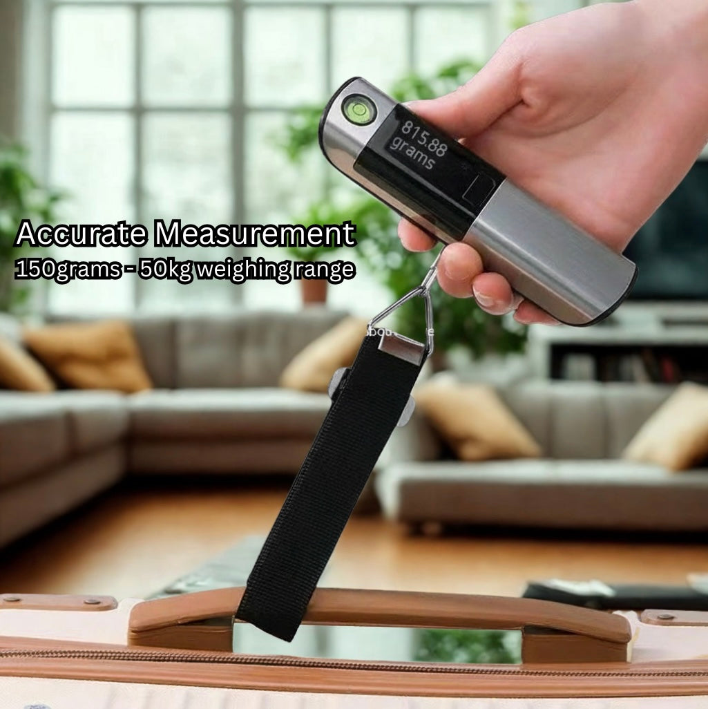 Hand holding a digital luggage scale with a hanger over a suitcase in a living room setting.
